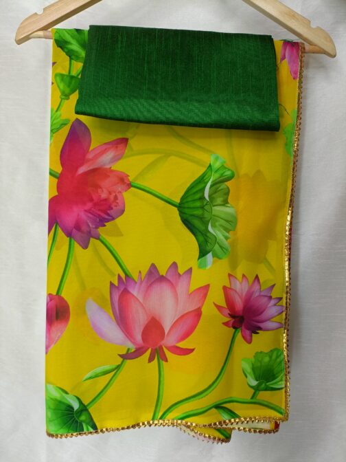Yellow floral digital lotus print saree with lace attached.