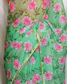 Green Georgette  with pink floral digital print all over sequins saree with lace attached paired up with pink silk zari embroidery blouse.