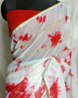 White with red shibori print Georgette  saree  with lace attached paired up with red Georgette sequins embroidery blouse.