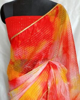 Red with multi color shibori print organza saree  with lace attached paired up with red Georgette sequins crochet embroidery blouse.